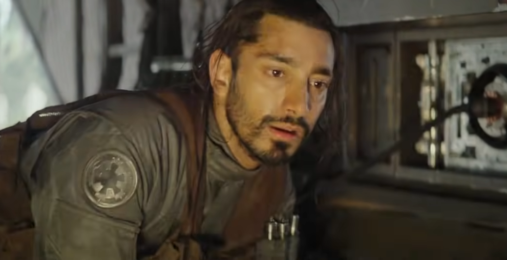 Riz Ahmed as Body looking scared in Rogue One