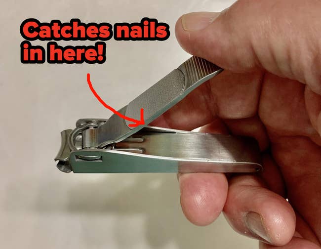 reviewer holding the nail clipper 