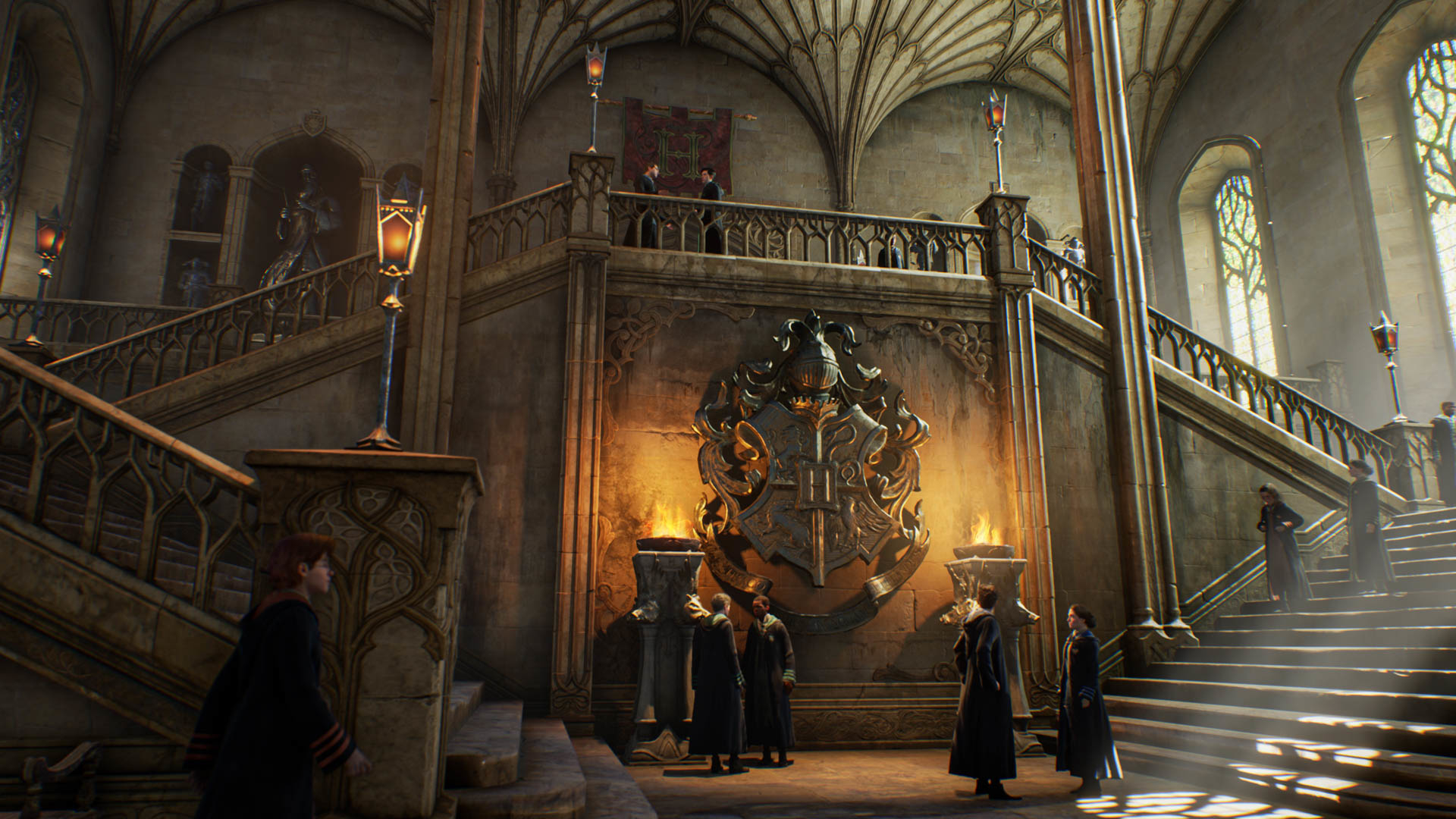 Students gather around near the main entrance of Hogwarts