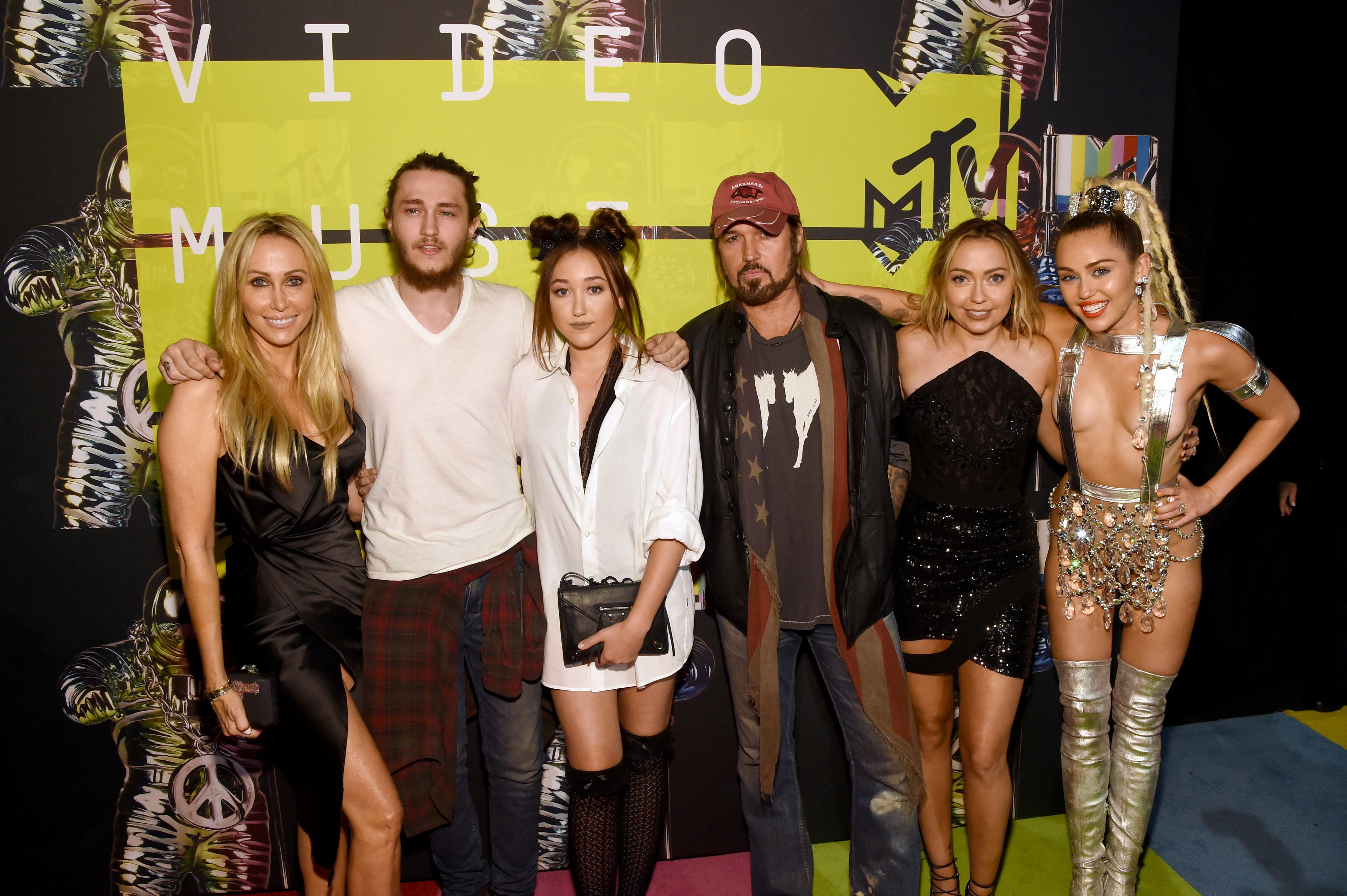 Billy Ray and TIsh with four of their kids at the VMAs