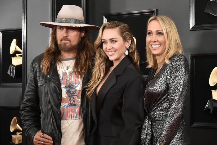 Miley with her mom and dad at the Grammys