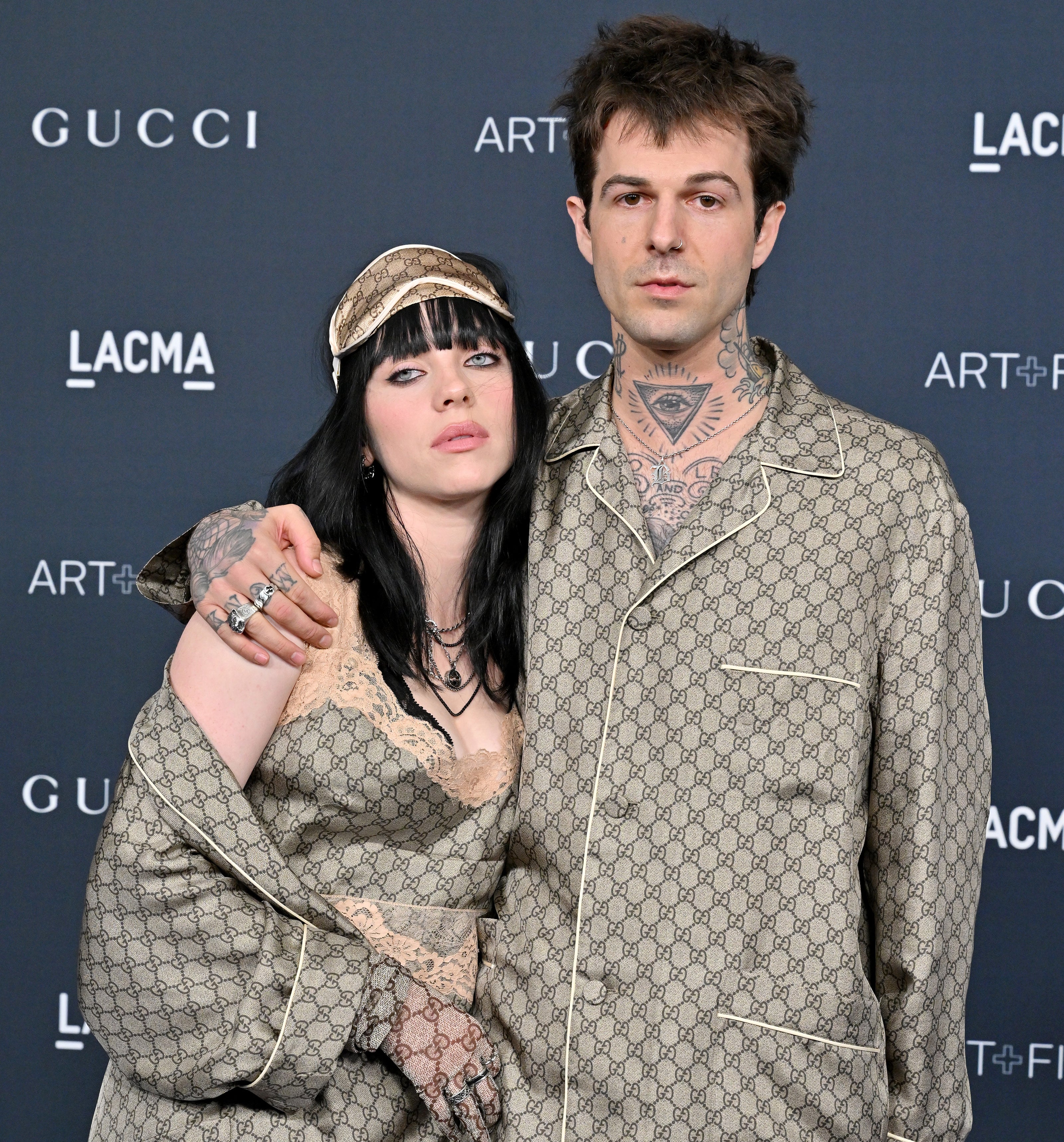Billie and Jesse together at an event when they were dating