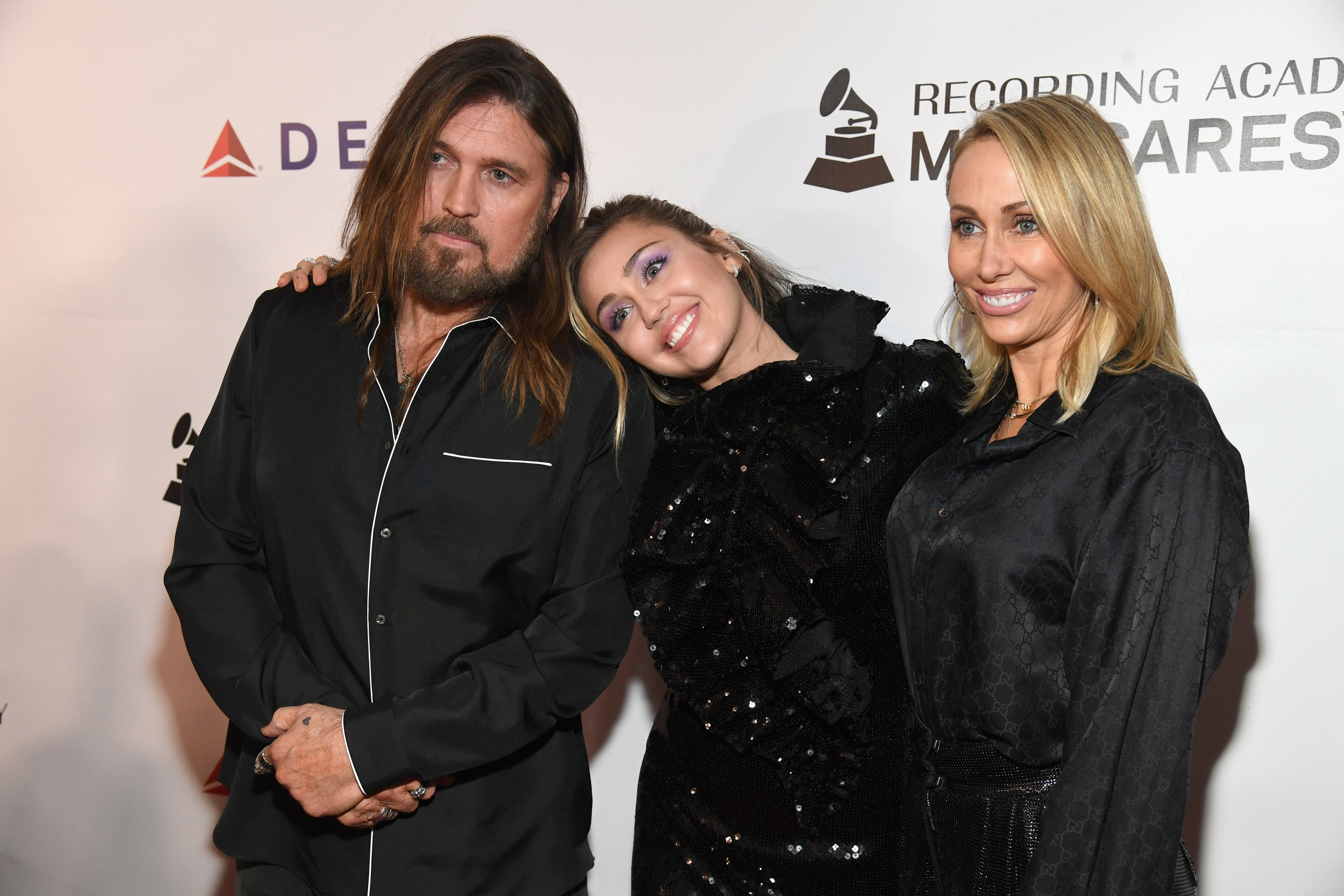 Miley and her parents at a Recording Academy event