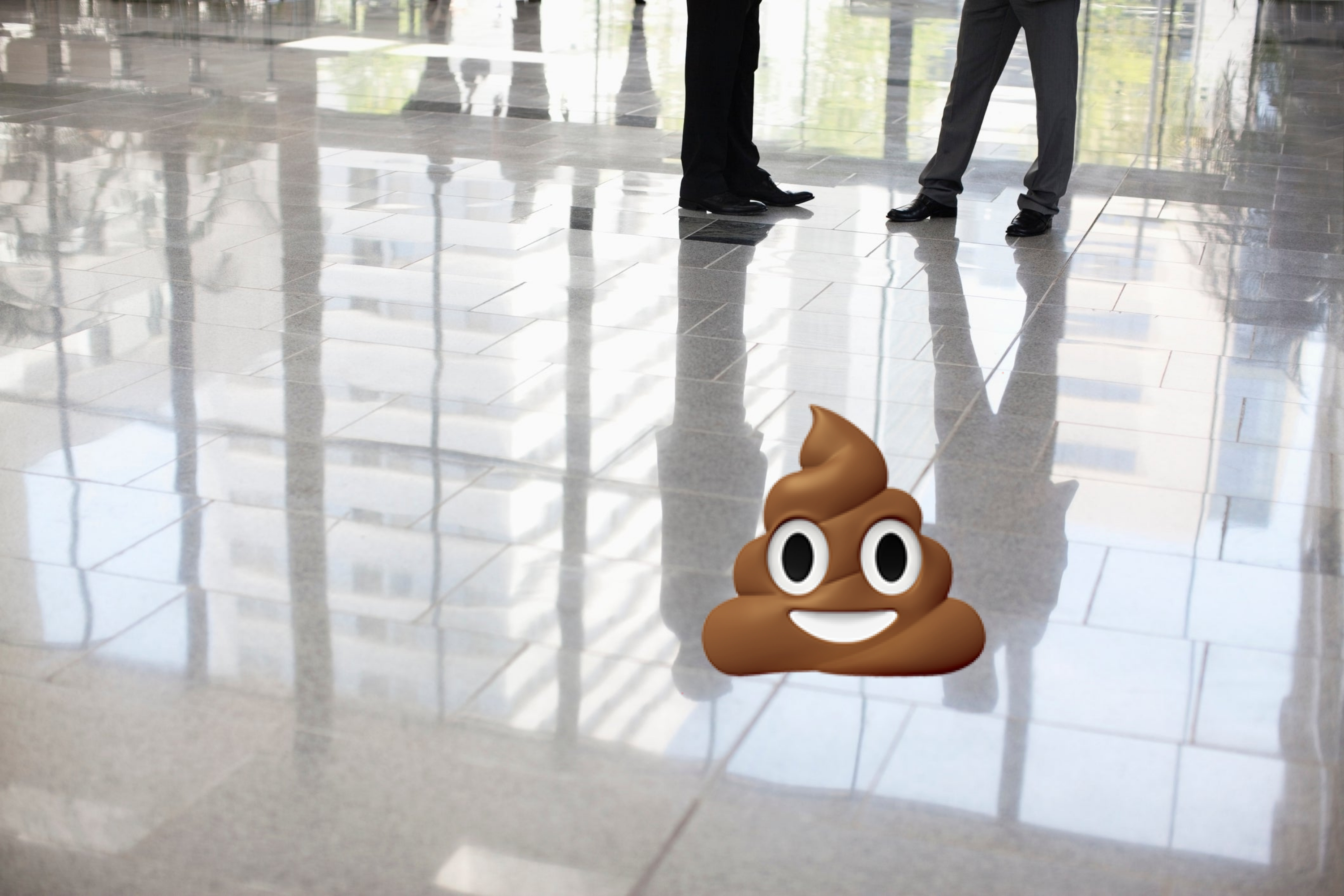 A poop emoji on the floor