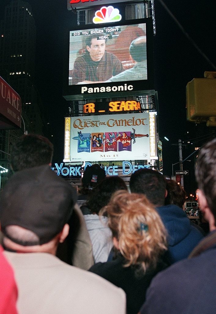 People watching &quot;Seinfeld&quot; in Times Square