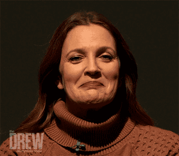 Drew Barrymore trying not to laugh