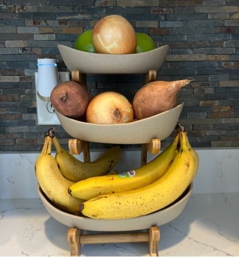 Reviewer&#x27;s photo of fruit basket on a white counter.