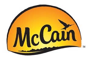 McCain's logo depicting the McCain text in front of a yellow semi circle evoking a sunrise or the golden colour of a potato and a silhouette of a swift for the dot of the i in Cain