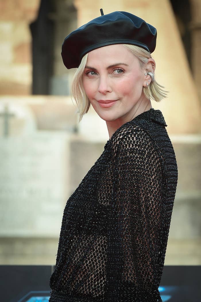 Closeup of Charlize Theron wearing a beret