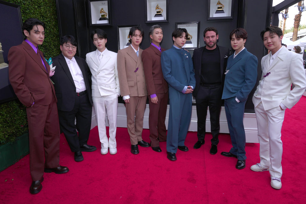 Scooter Braun and Hybe Corp chair Bang Si-hyuk with BTS on the red carpet