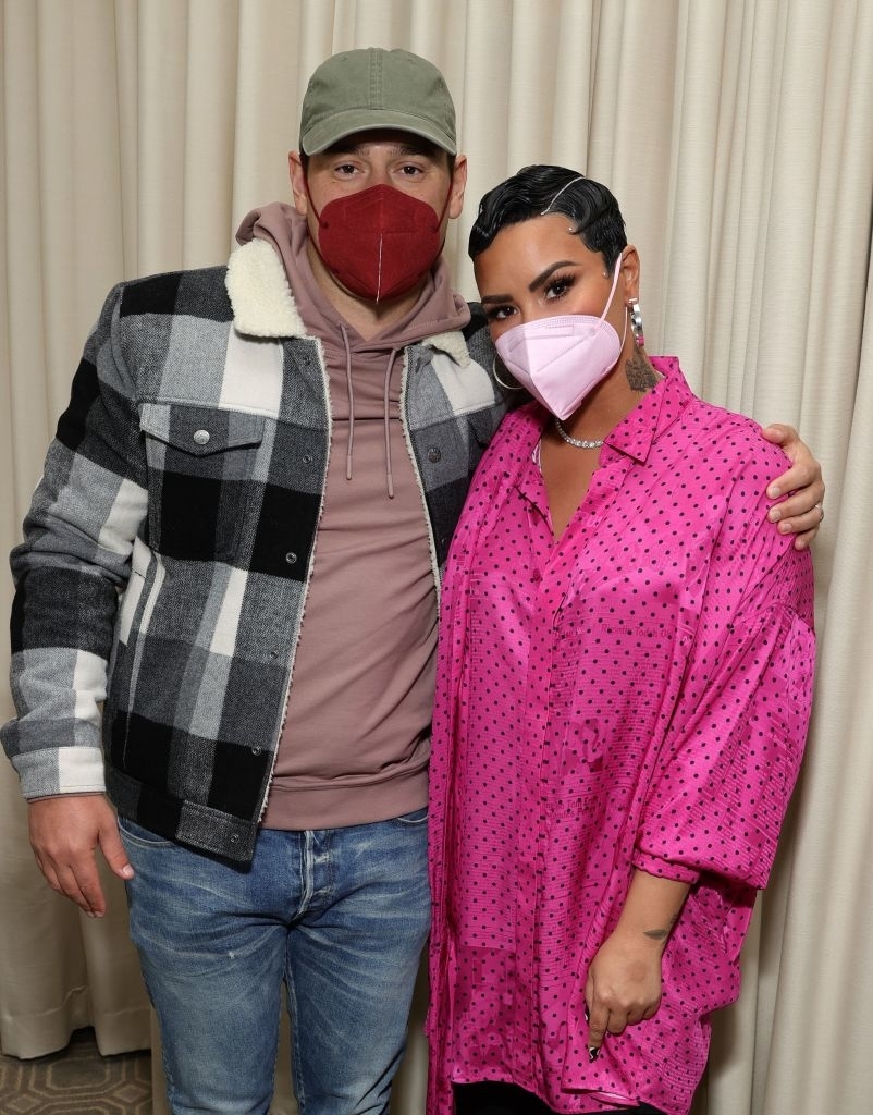 A close-up of Scooter and Demi wearing KN95 masks