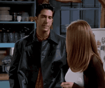 Ross from Friends making a flip off gesture to Rachel
