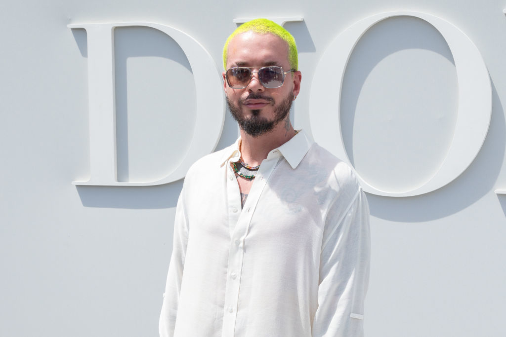 A close-up of J Balvin smiling at a media event