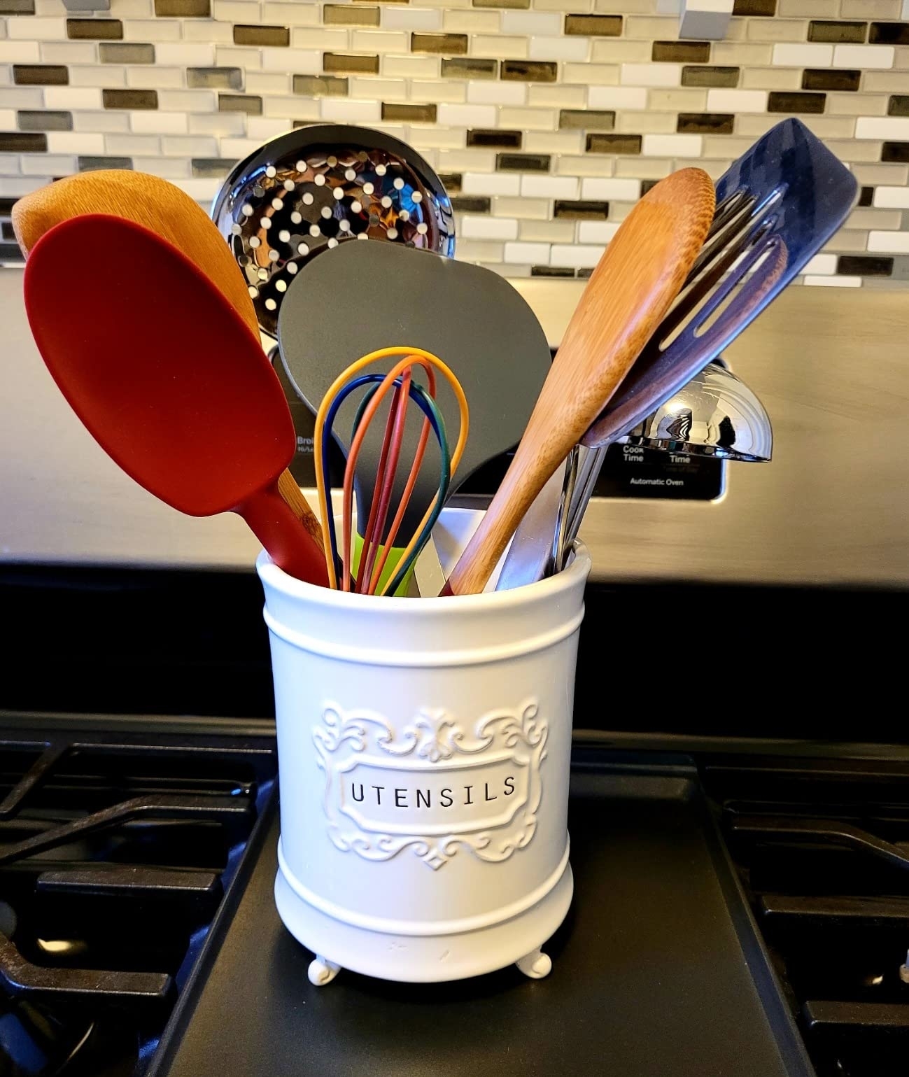 a reviewer's utensil holder on their stove