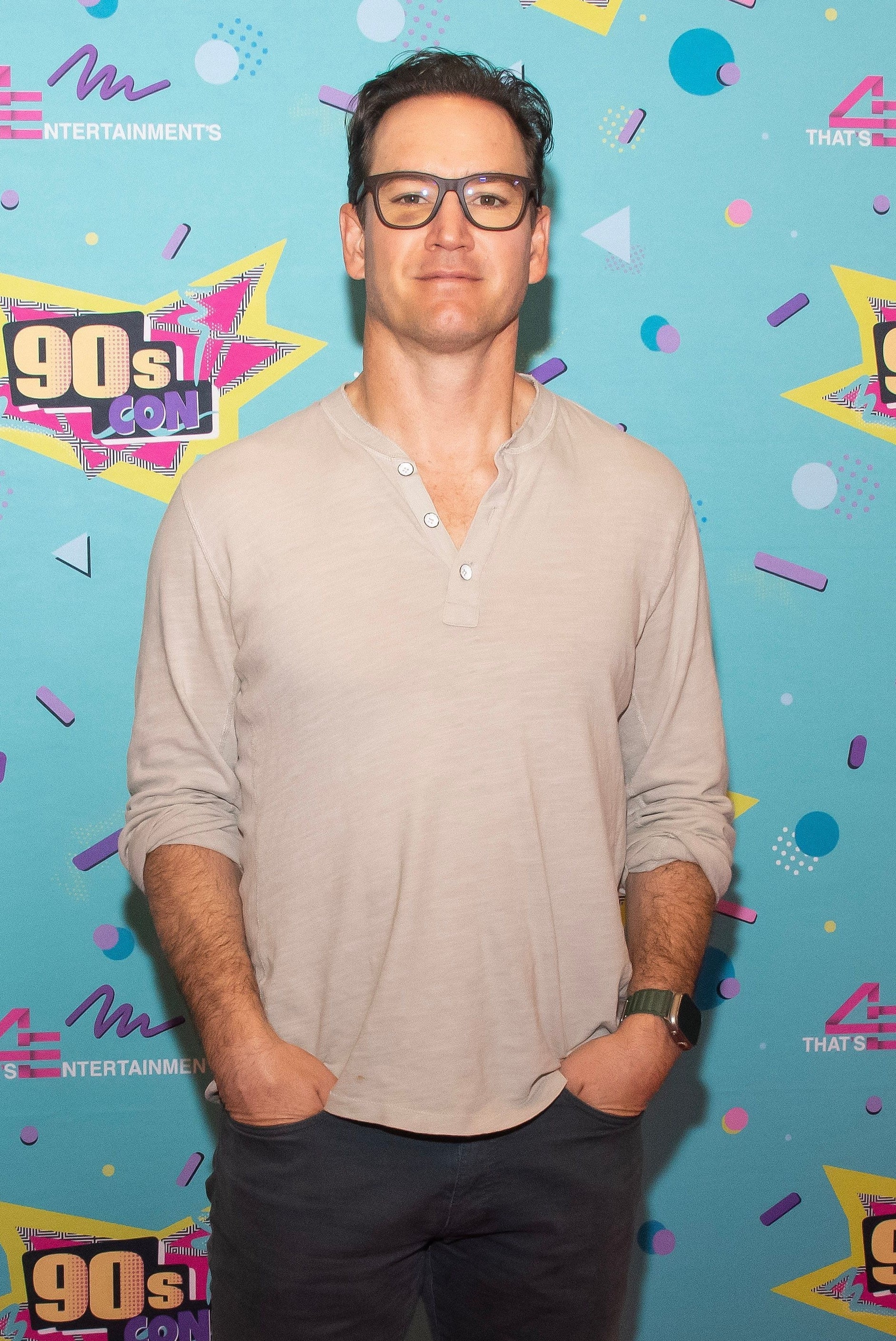him at an event wearing glasses
