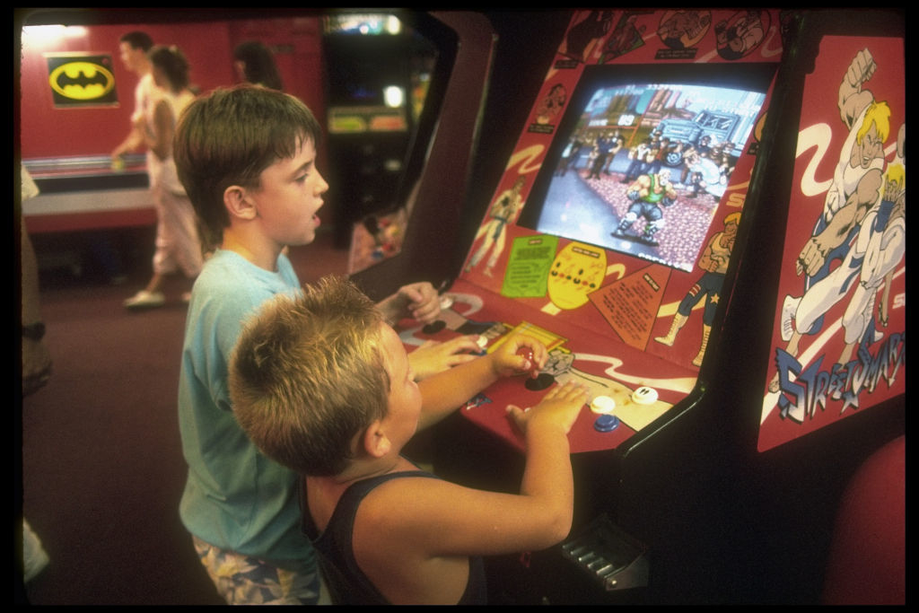Kids playing at an arcade