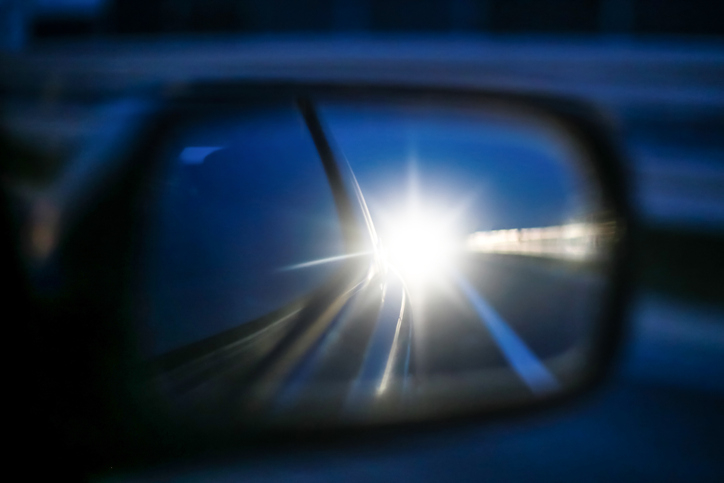 A headlight in someone&#x27;s side mirror