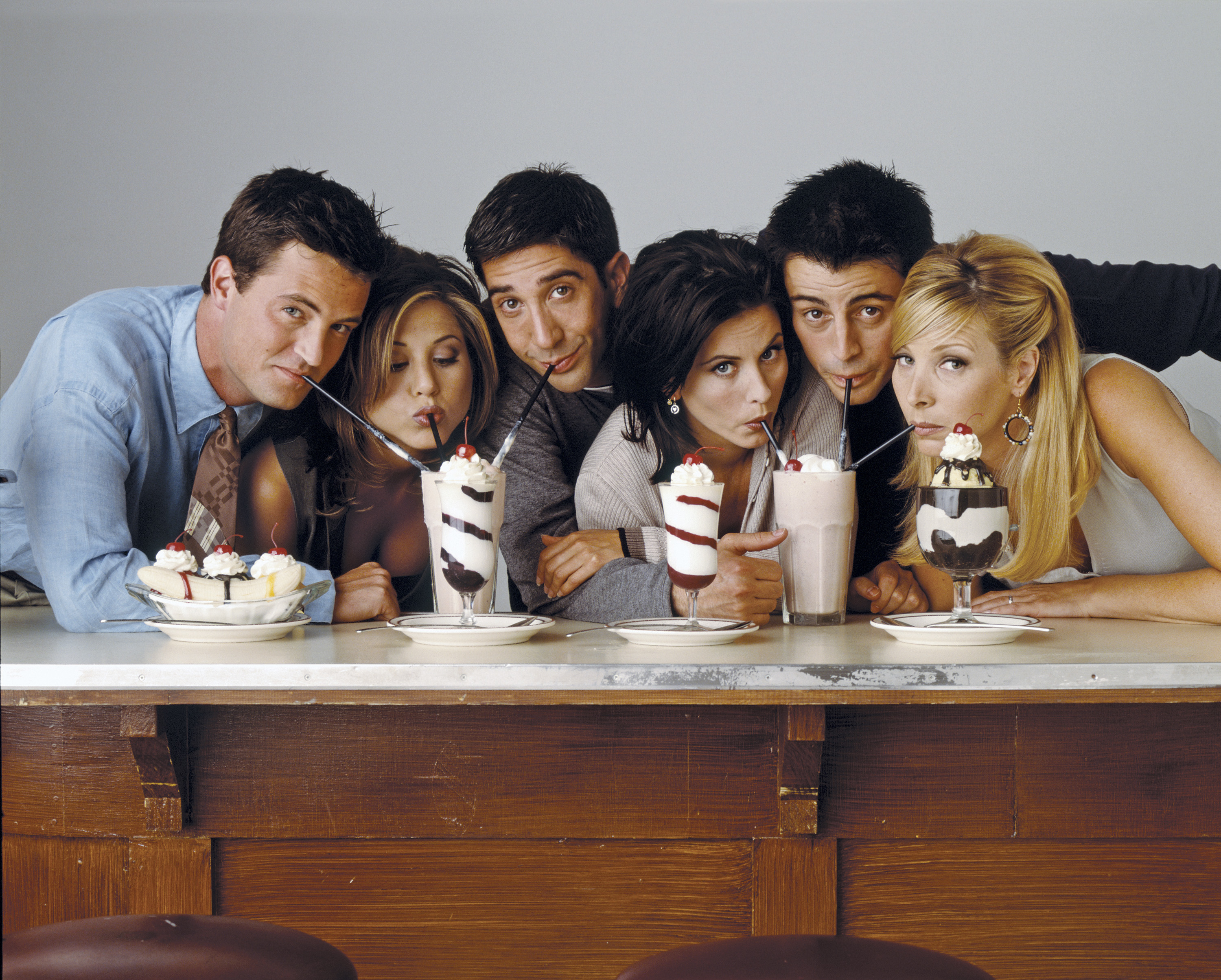 The Friends cast eating milkshakes