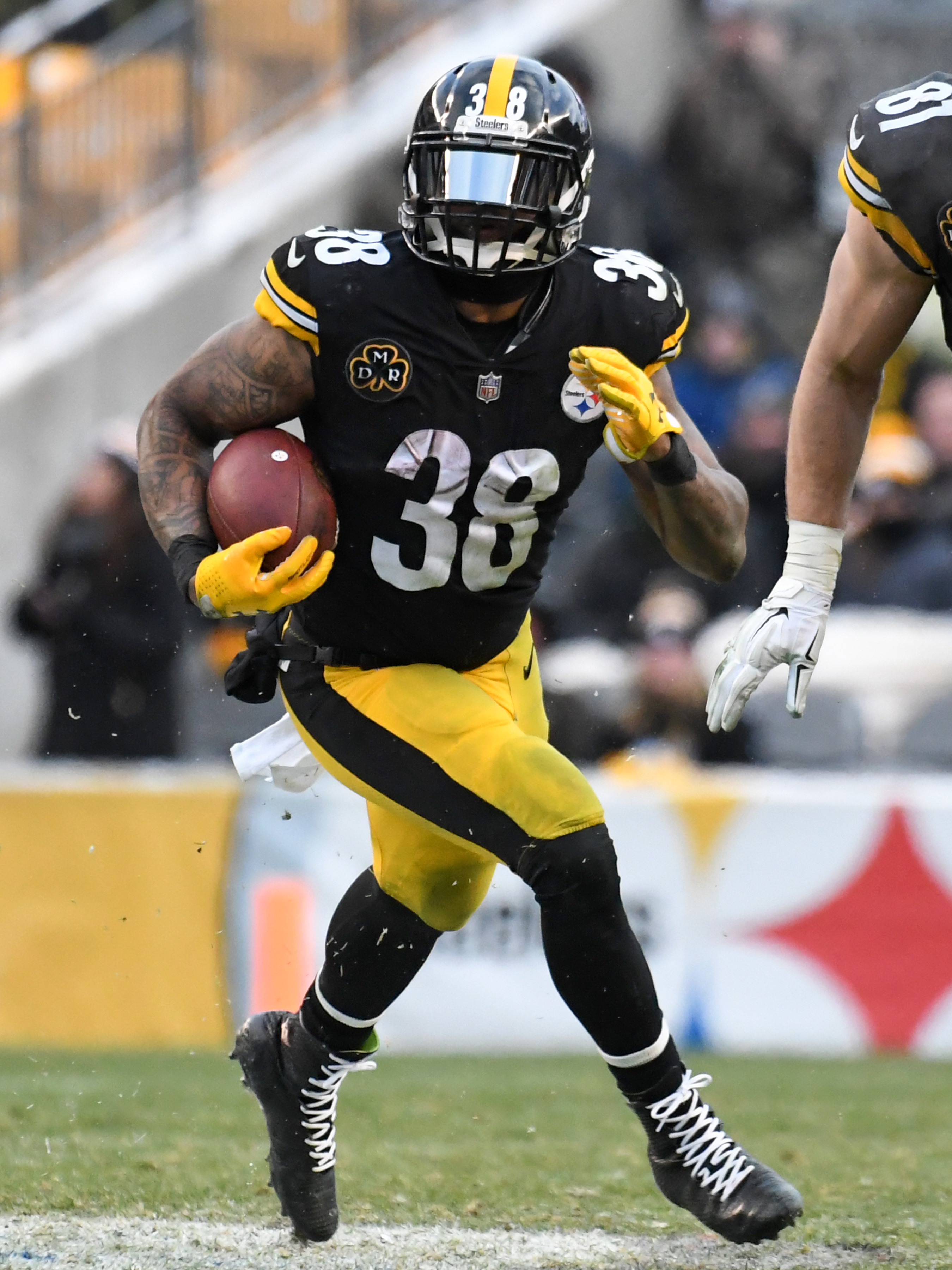 Kevin in his NFL uniform on the field