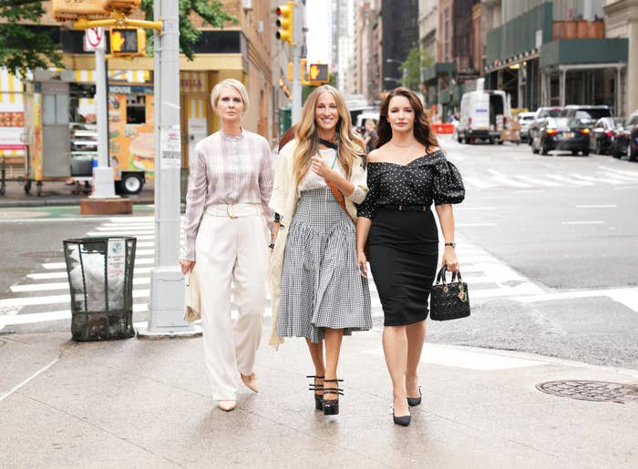 Miranda, Carrie, and Charlotte walking down the street