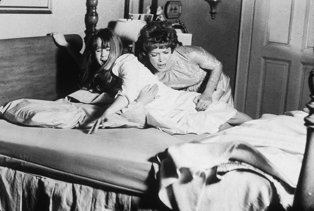Ellen as Regan&#x27;s mother trying to help Regan in her bed