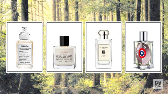 Bottles of fragrance in an woodland setting.