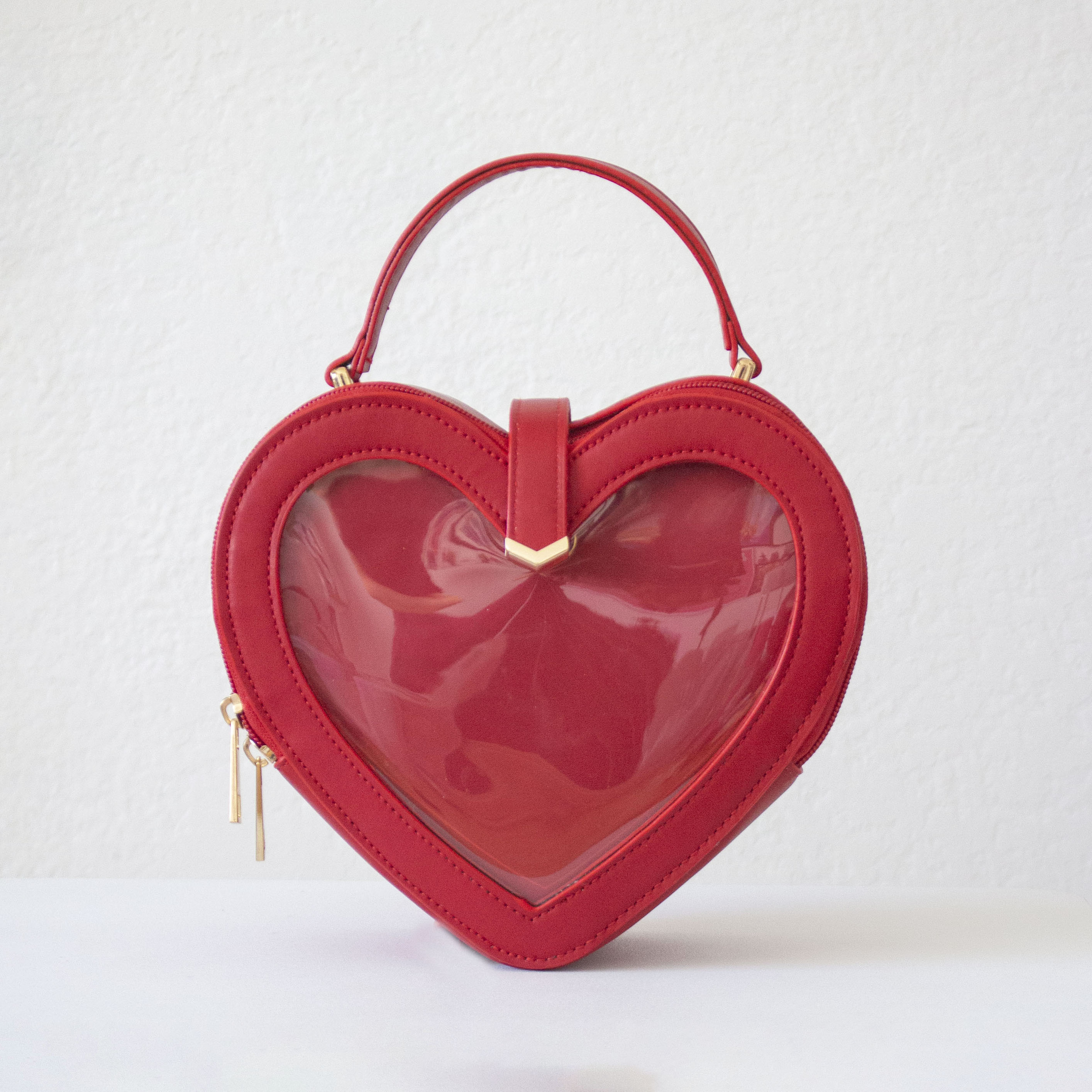 Red Heart Ita Bag on white background