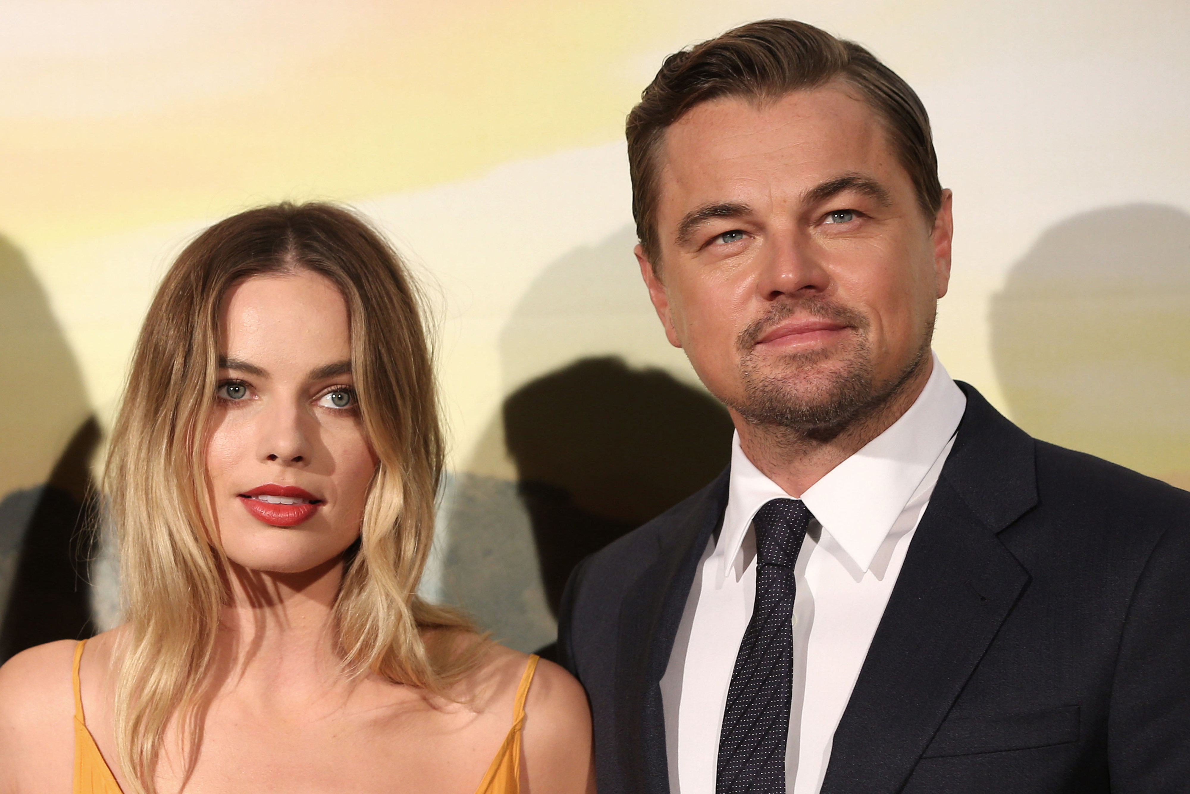 Close-up of Margot and Leo at a media event