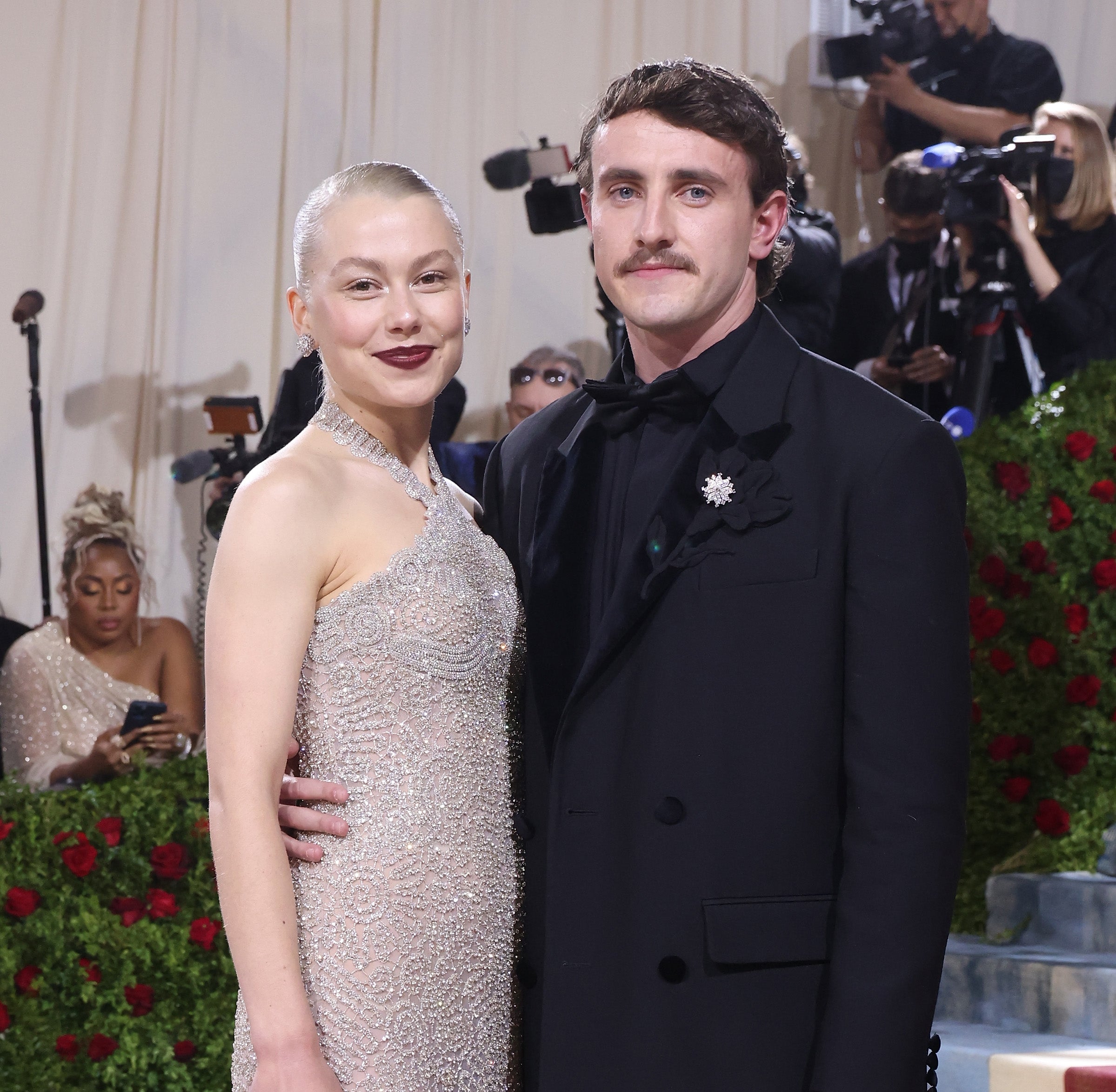 Phoebe and Paul embracing on the red carpet