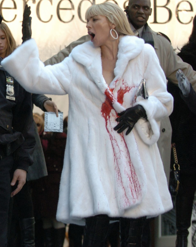 samantha jones with fur coat and fake blood on it