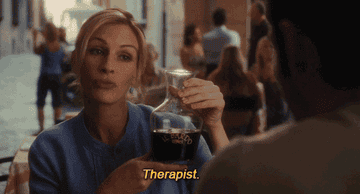 julia roberts holding up wine and saying therapist