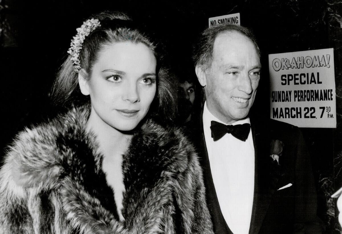 a young kim cattrall with pierre trudeau in black and white