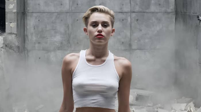 A closeup  of Miley in a crop top