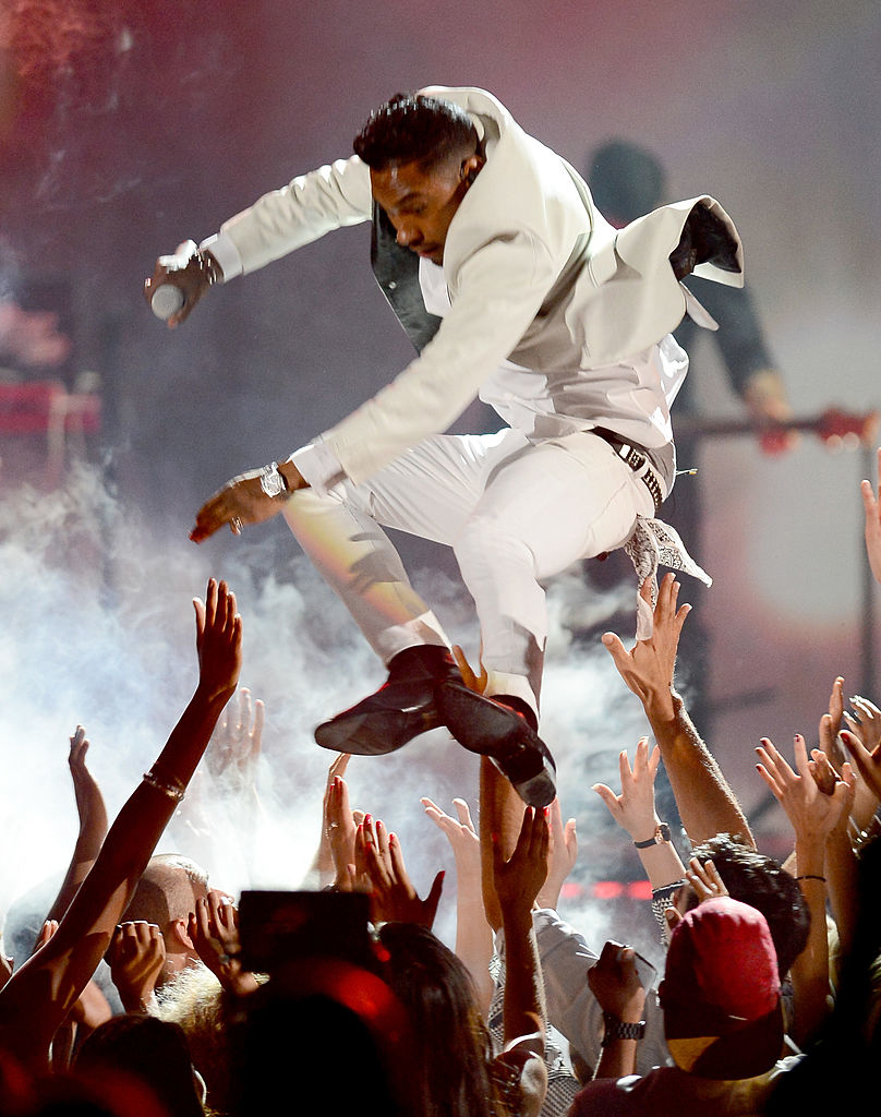 miguel jumping in the crowd