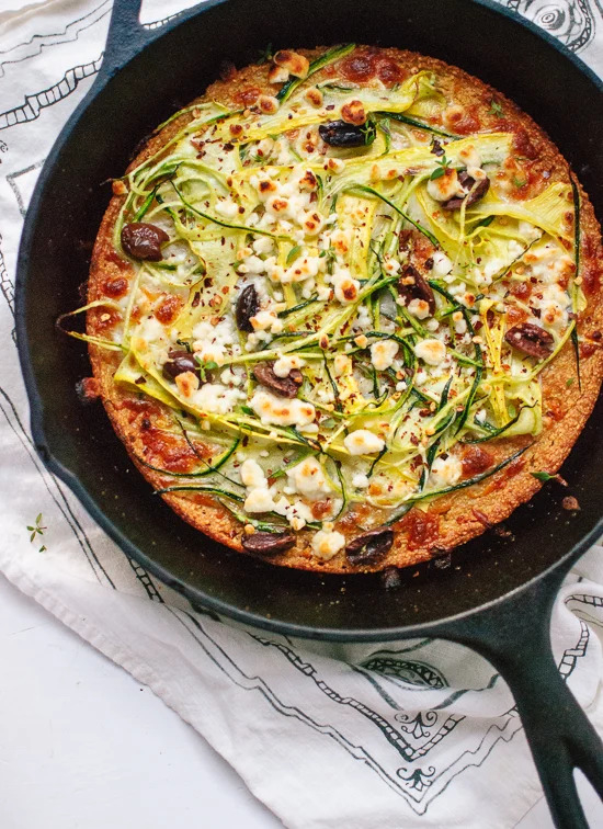 socca pizza in a cast iron pan