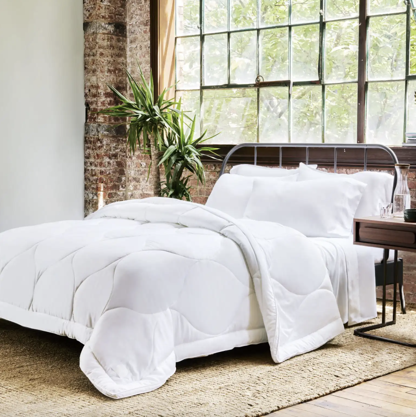 white comforter on a bed