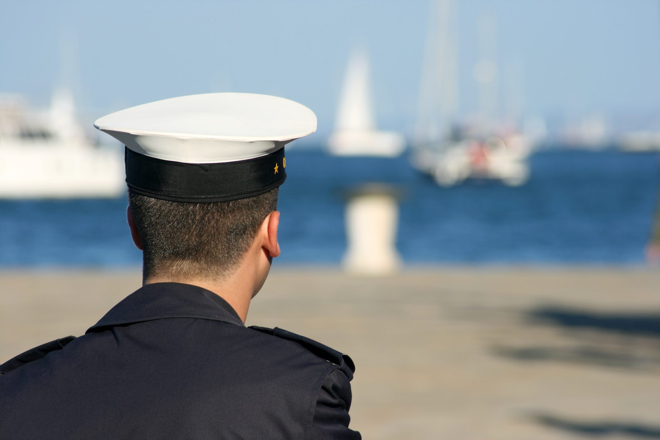 A naval officer looking out to sea