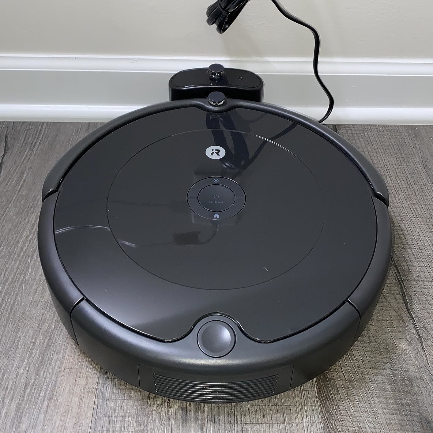 a reviewer photo of the Roomba
