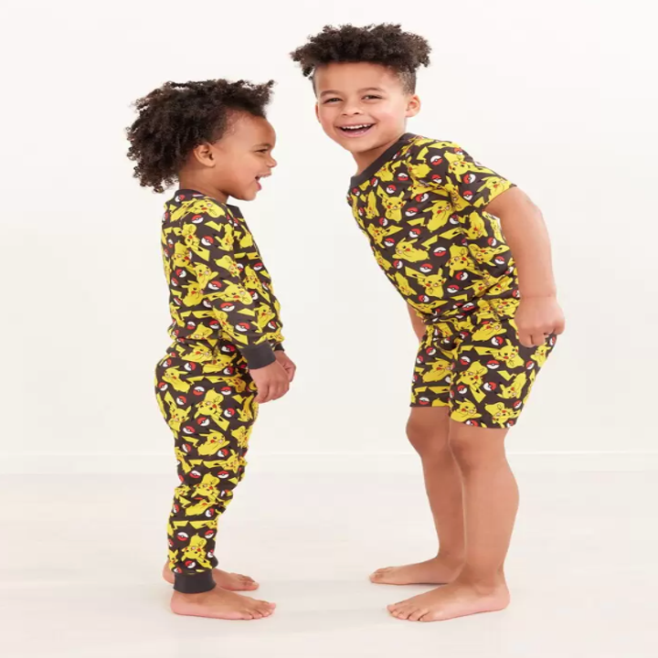two children in pikachu pajamas