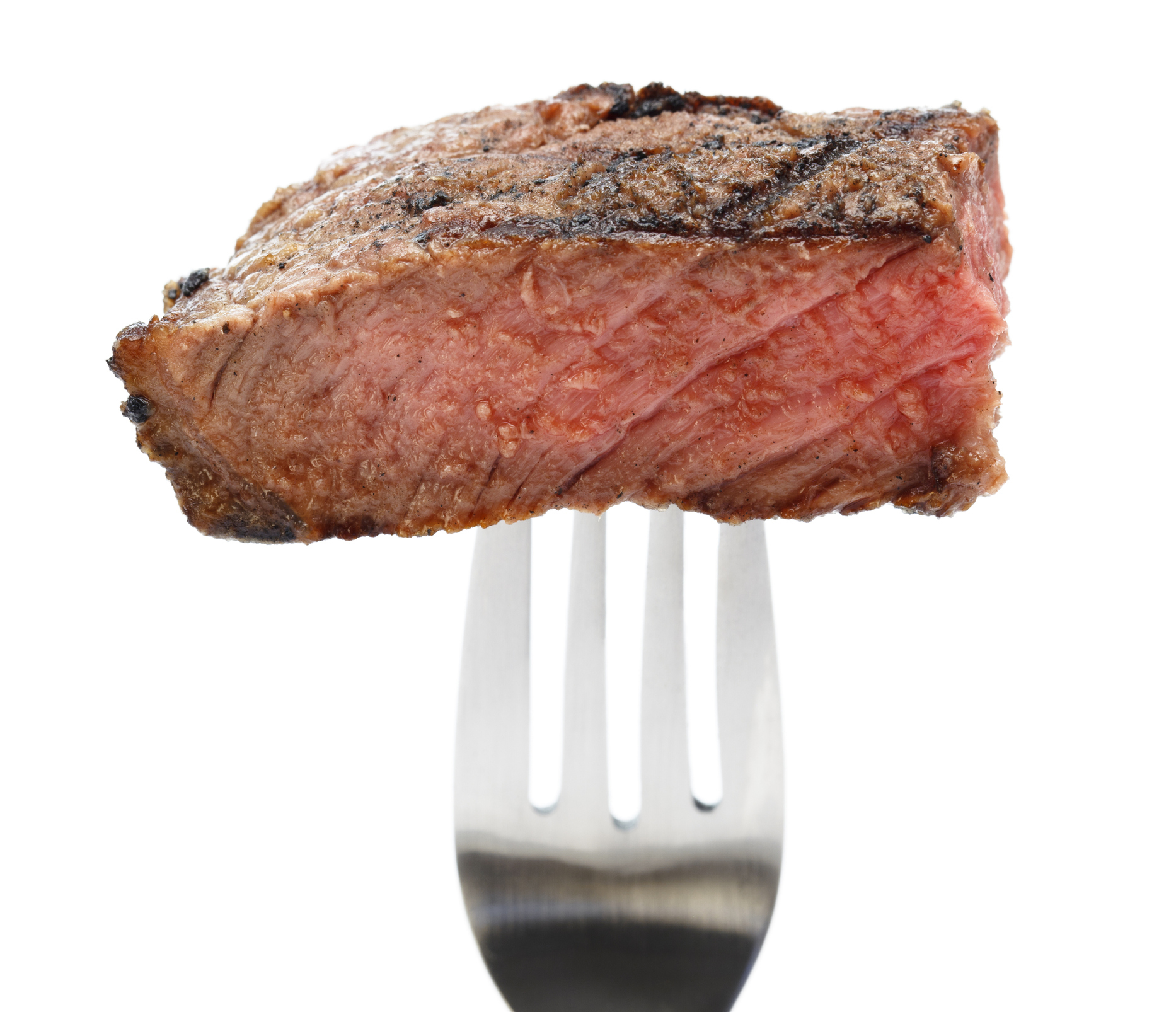 A piece of steak on a fork