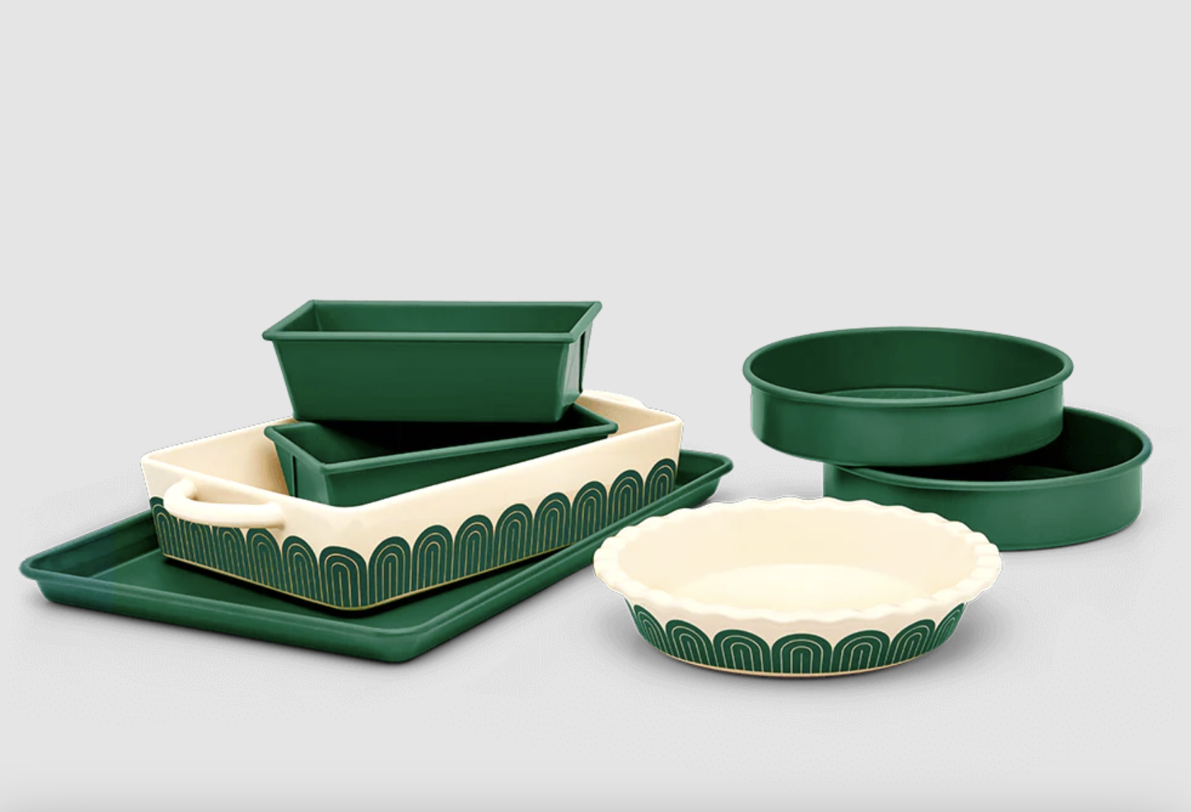 the 7-piece green and white bakeware set with a pie pan, large cookie sheet, square baking dish, and more