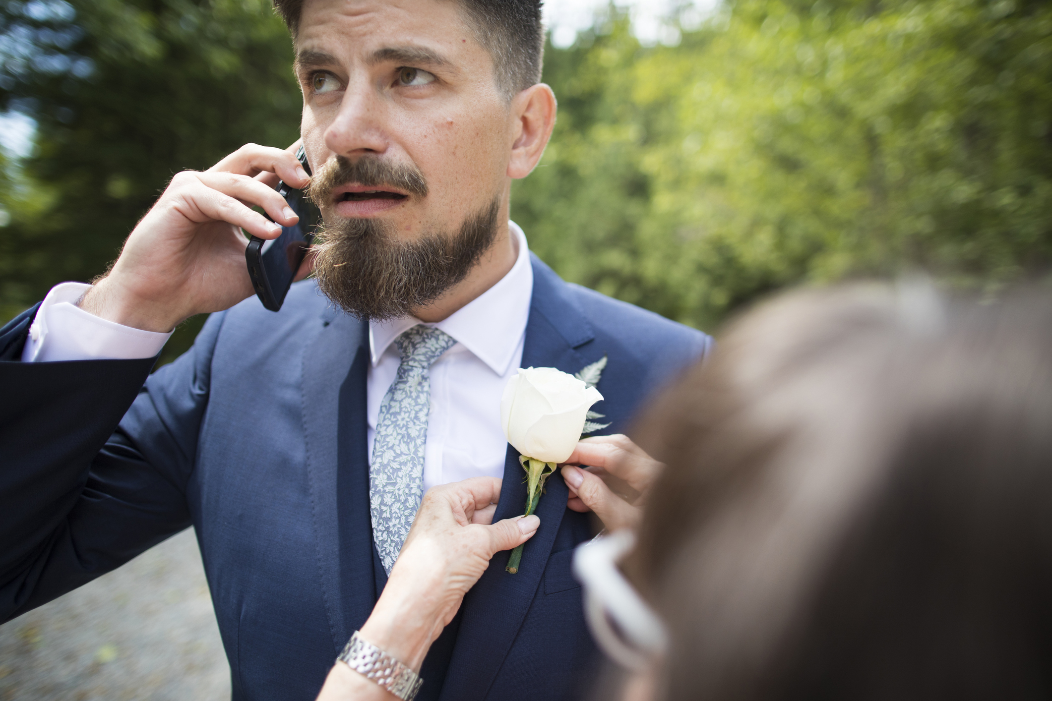 A groom on the phone
