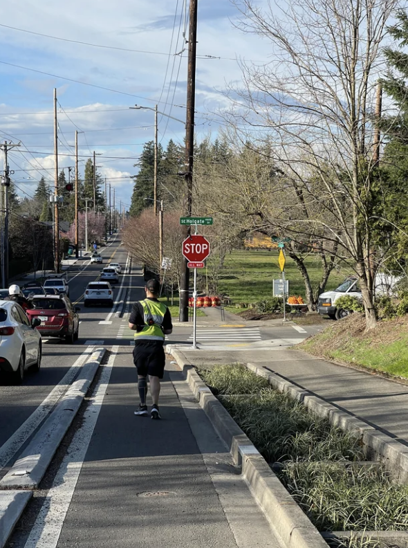 A person running in the bike lane