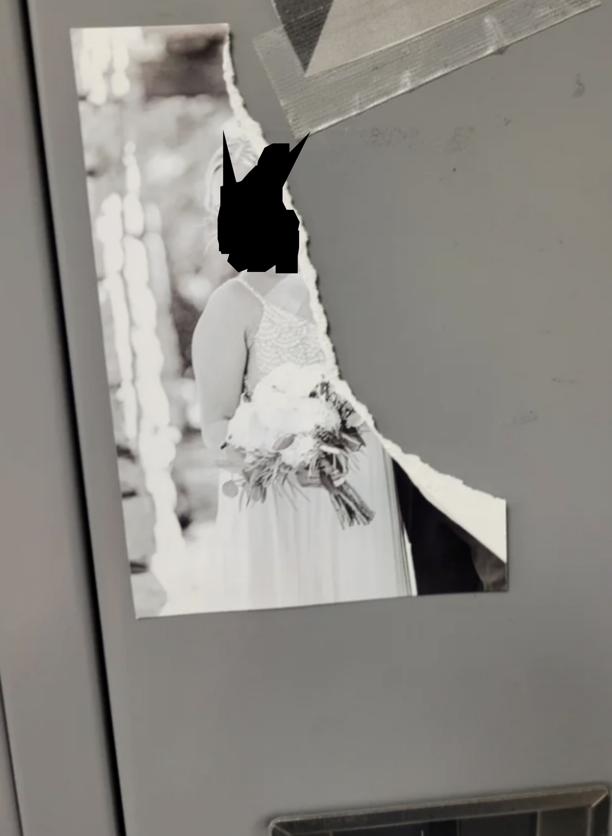 A ripped wedding photo