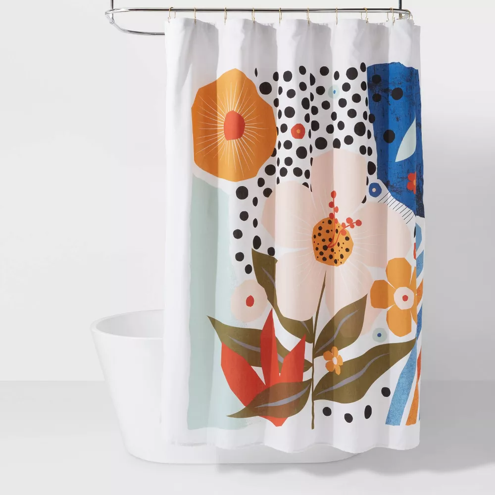 The shower curtain with a colorful, modern floral graphic
