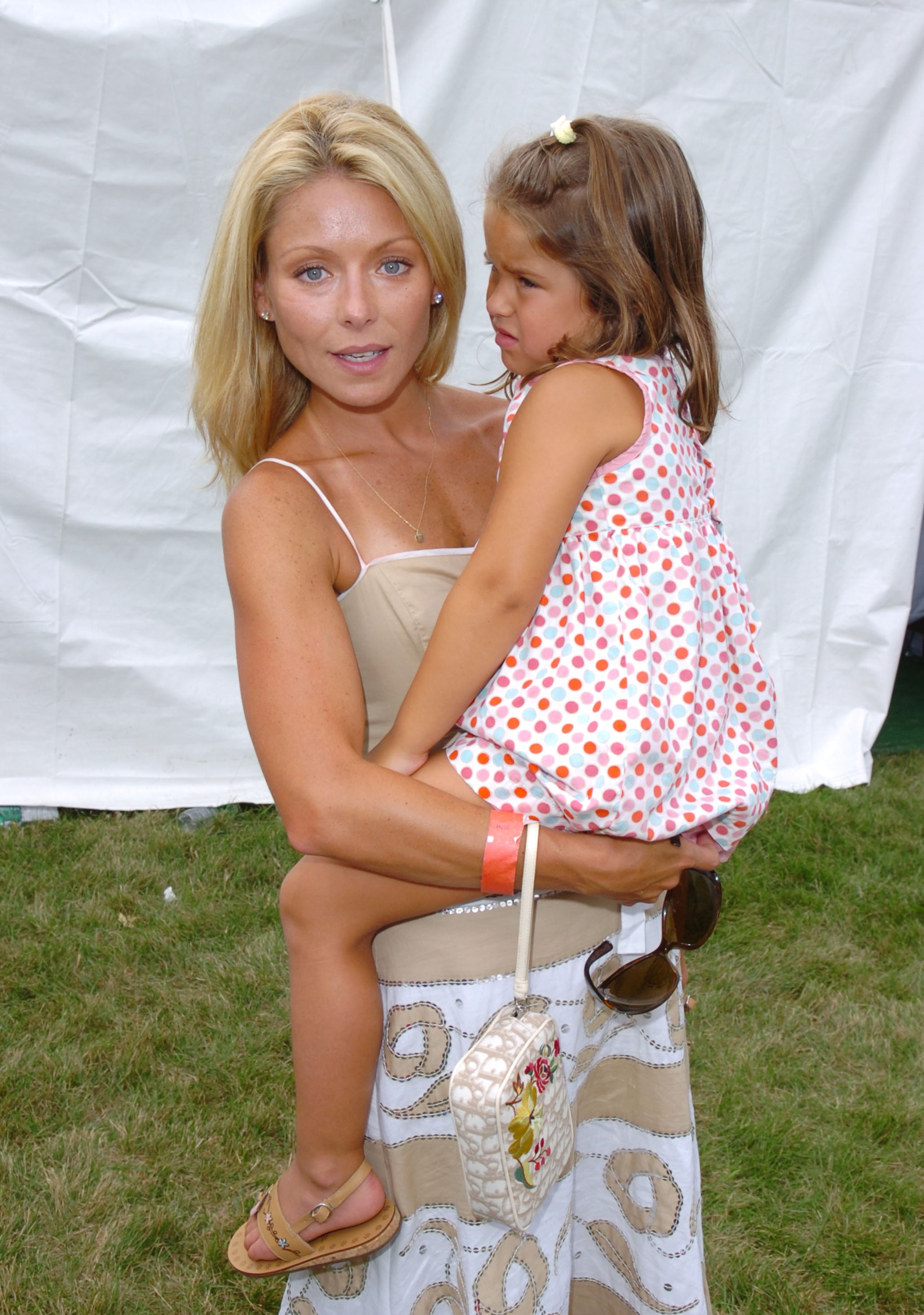 Kelly Ripa holding Lola