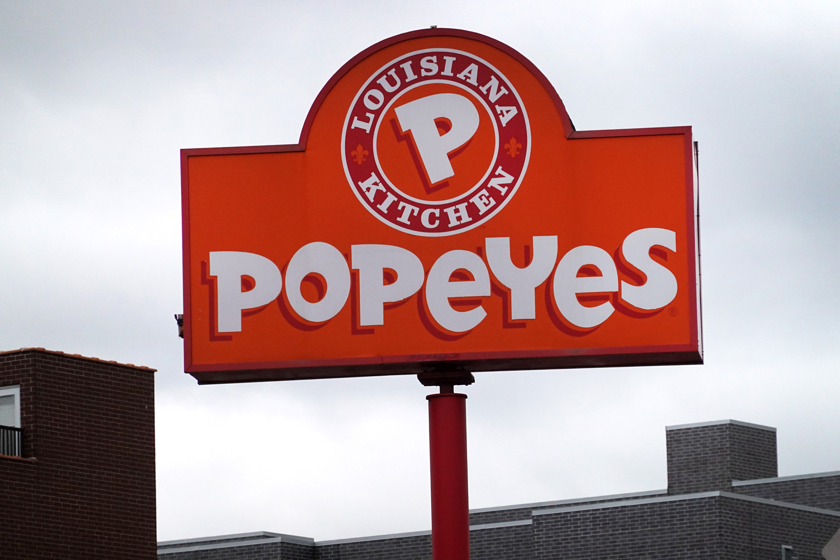 Close-up of Popeyes sign