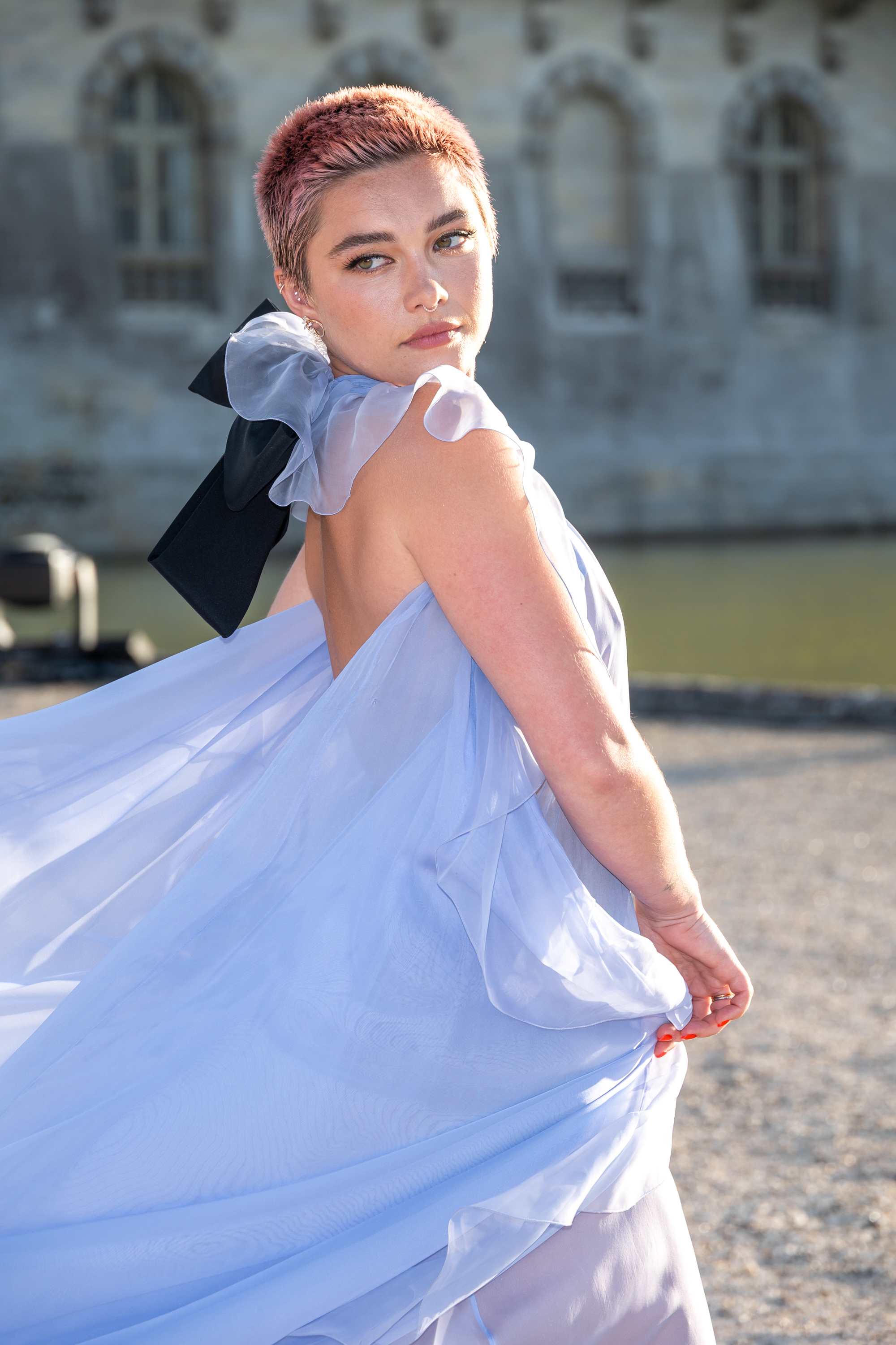 emotionnal shot. fragile shy woman with sheer dress