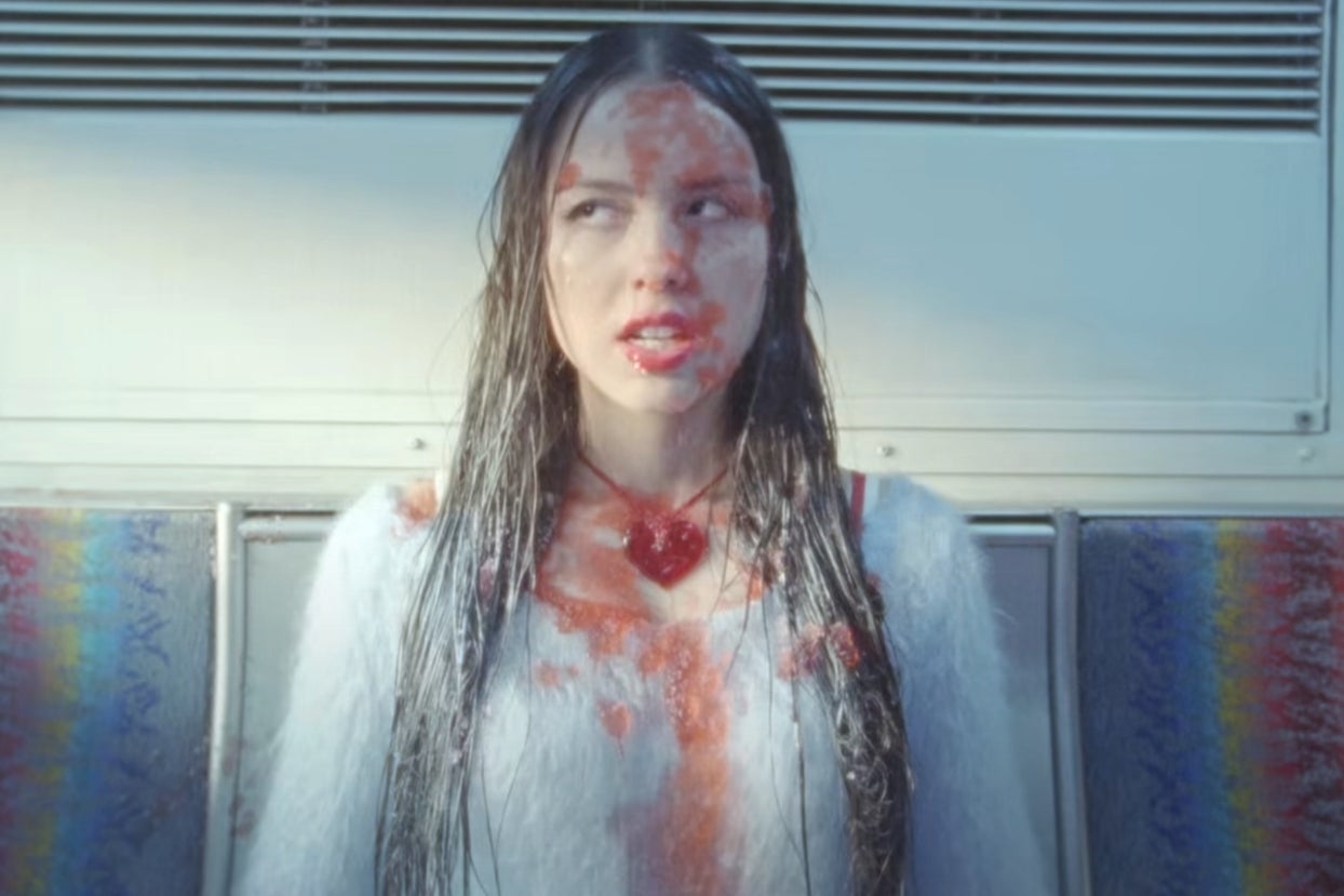 Olivia Rodrigo covered in a slushie in the Bad Idea Right music video