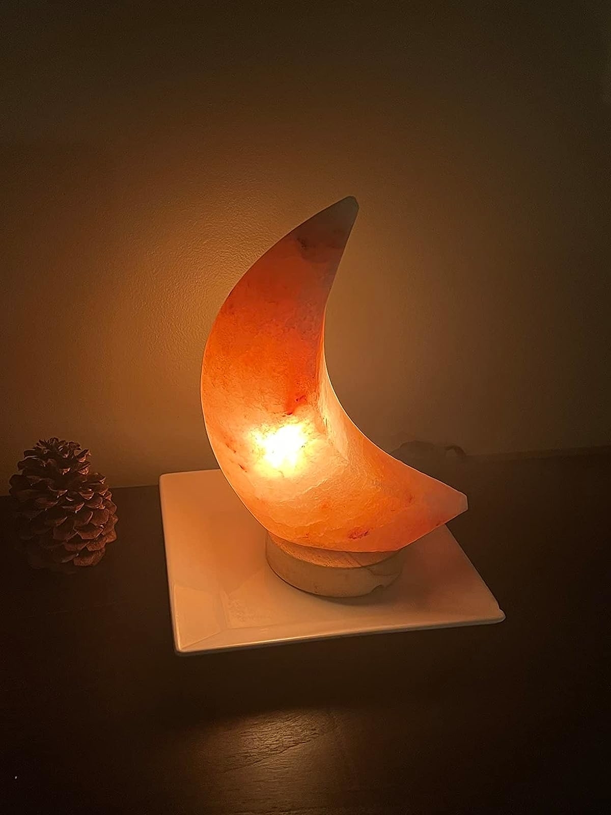 Reviewer image of the moon shaped lamp lit up